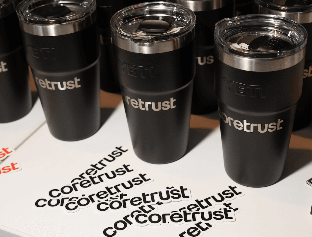CoreTrust branded Yetis and stickers.